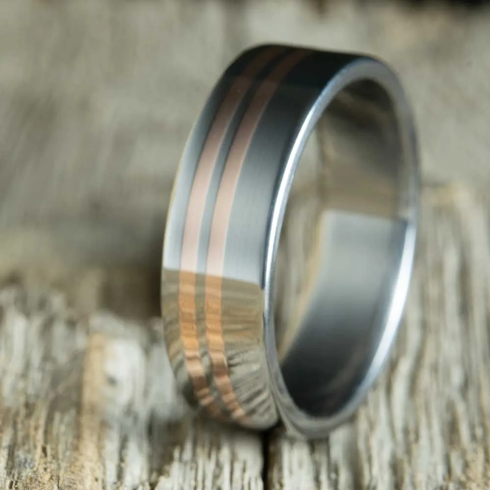 Custom Titanium ring with copper pinstripes