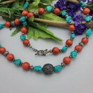Stylish Beaded Necklace with Turquoise, Coral, and Antique Sterling Silver Beads.